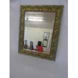 Ornate framed mirror