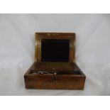 Burr walnut antique writing slope with 1 ink well.
