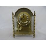 Brass cased dome top anniversary clock.