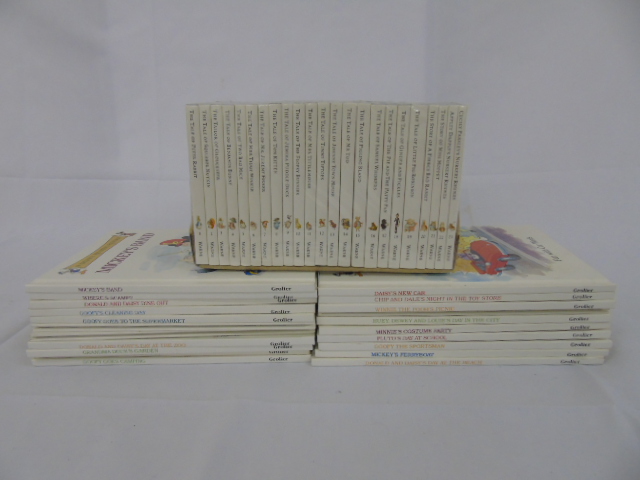 A set of Beatrix Potter books plus a collection of Disney books