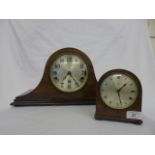 Wooden cased dome top mantle clock with Westminster chime and a small oak cased clock.