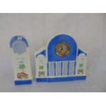 Porcelain cased bedroom clock with matching vase