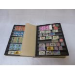 Brown album of various stamps