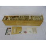 Large wooden boxed collection of various world stamps.