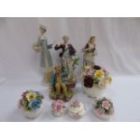 Collection of 4 porcelain figures and 5 floral posies to include Shelly examples