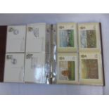 Brown album of mainly stamp postcards