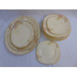 A collection of 14 Royal Doulton floral plates including a graduated set of 3 meat plates