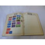 Blue stamp album and contents