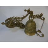 Large brass shop bell overall length approx 17" and a smaller example in the form of a ships wheel