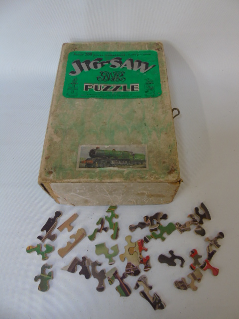 Boxed wooden jigsaw puzzle of a train