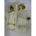2 Porcelain dolls both in wedding dresses