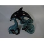 Poole pottery dolphin, seal and otter