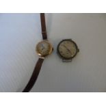 Gold cased wrist watch and a silver cased wrist watch