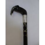 Indian Ebony and Ivory walking stick with carved elephant handle and silver mount approx. 35" long