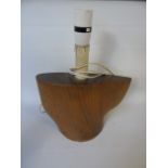 Vintage wooden lamp base made from a section of aircraft propeller