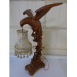 Carved wooden oriental lamp in the form of an eagle in flight approx 24" tall