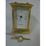 Vintage brass carriage clock with enamel dial Robert Blanford 1873 with key