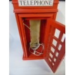 Novelty home telephone in the form of a red phone box