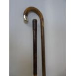 Silver mounted walking stick and a leather handled walking cane