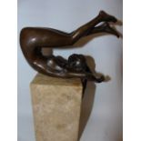 Cast bronze figure of a nude lady in yoga pose on marble base approx. 11" tall