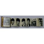 Beatles book shaped locket with fold out black and white photos. c.1964 UK (1)