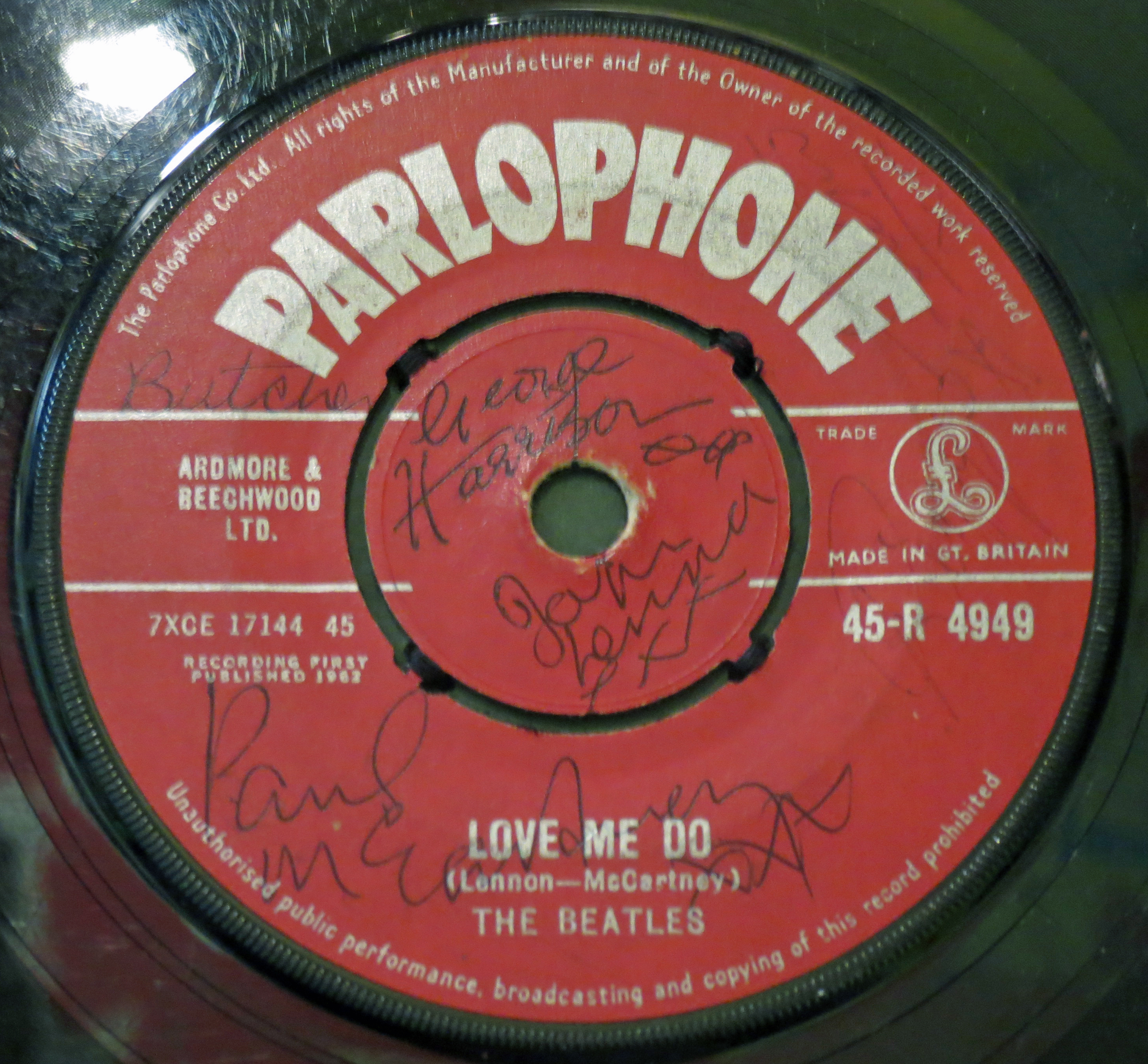 The Beatles Love Me Do single signed at Dawsons Record Shop, Widnes on 6th October 1962. The