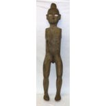 Standing figure of  a priapic man, the t