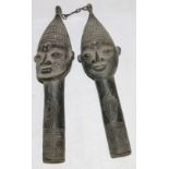 Pair of bronze staff heads with elaborat