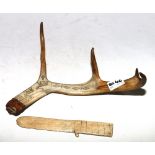 Carved reindeer horn with incised images