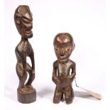 African kneeling figure, with prominent