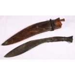 WWII kukri of typical form with carved w