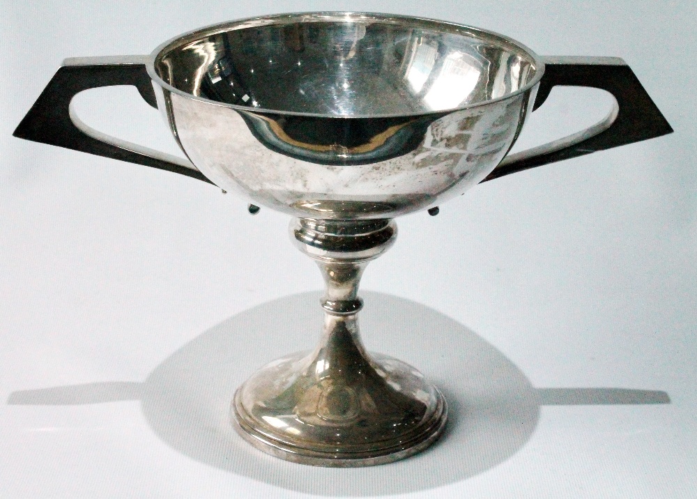 Silver two-handled trophy cup of hemispherical form on spreading foot, by Nathan & Hayes, Chester