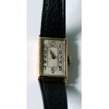 Lady's 18ct gold rectangular wristwatch, inscribed and dated 1924.