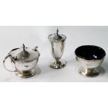 Silver three-piece condiment set of half ovoid shape with wavy reeded edges by Walker & Hall,