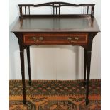 Edwardian lady's mahogany and inlaid writing table with low, galleried back, leather skiver and