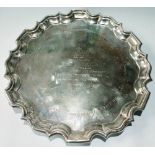 Silver circular waiter with shaped, moulded edge, inscribed, by Neill, Belfast (Dublin), 1910,