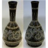 Pair of Doulton Lambeth stoneware vases, possibly by Emma Martin, in browns and blues with applied