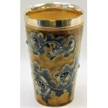 Doulton Lambeth stoneware beaker by L. Francis, with blue scrollwork and applied beads on a brown