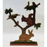 WILLIAM MILES JOHNSTON (1893 - 1974)
Painted wood tree with rabbits, squirrels and birds, retailed