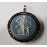 Good Georgian gold large memoriam pendant with circular Wedgwood blue Jasper classical figure within
