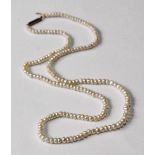 Necklet of small oriental saltwater pearls.