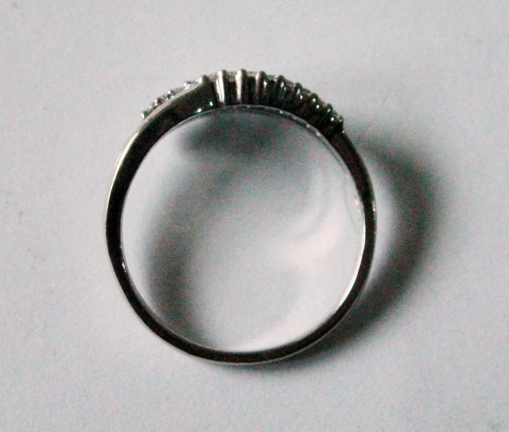 Modern openwork ring with tiny diamonds in 18ct white gold. - Image 2 of 3