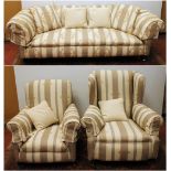 20th century three-piece lounge suite upholstered in striped floral fabric and raised on turned