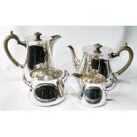 Good silver four-piece tea set of plain, tapering, flared shape comprising a teapot and hot water