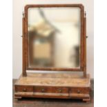 19th century Queen Anne style walnut toilet mirror with three frieze drawers.