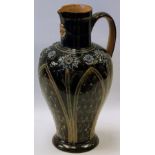 Doulton Lambeth stoneware jug, possibly by Emily Partington, with arched panels, applied rosettes,