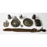 Three silver medals, three thimbles, a vesta case, a padlock and a gilt guard chain.