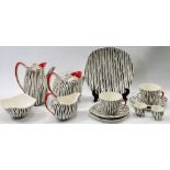 Midwinter Fashion Shape half tea set of Zambesi pattern with red embellished rims on teapot, hot