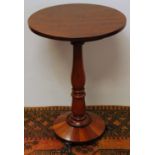Regency mahogany circular occasional table on turned column with sloping circular base, on three