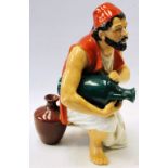 Royal Worcester figure, 'Algerian Water Carrier', modelled by James Hadley, 1877, 15cm high.